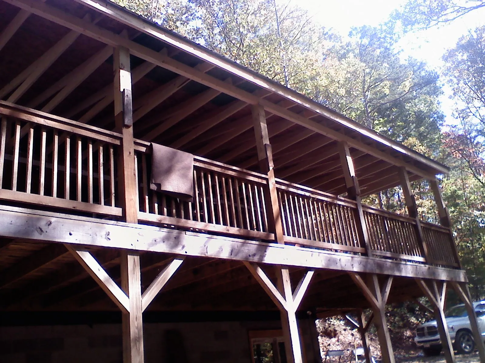 Timber framing under a new elevated porch and deck — Roof Leak Repair in Gary by Roofing Brothers